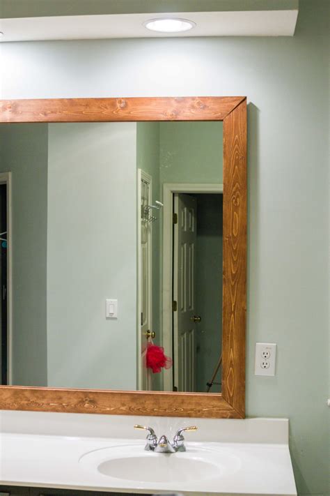 how to diy upgrade your bathroom mirror with a stained wood frame building our rez