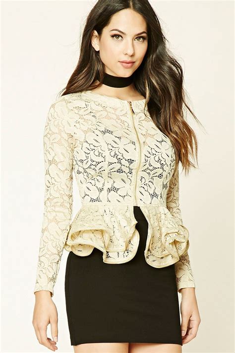 a semi sheer lace jacket featuring a peplum silhouette zip up front round neckline zippered