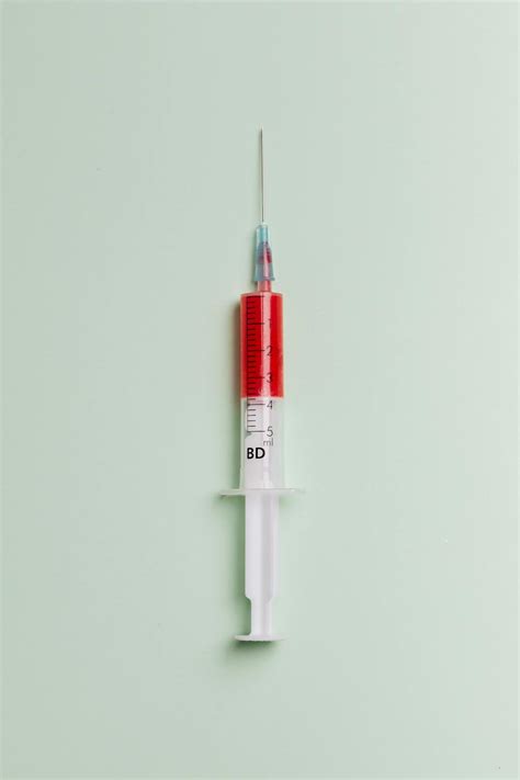 Syringe With Red Liquid · Free Stock Photo
