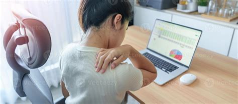 Woman Having Neck And Shoulder Pain During Work Long Time On Workplace
