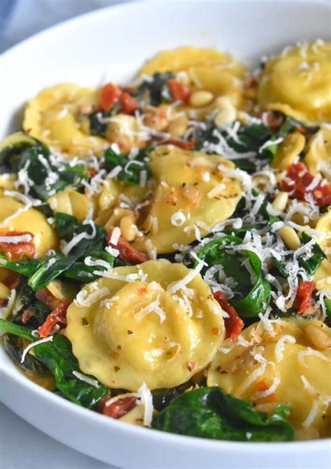 Ravioli With Spinach Sun Dried Tomatoes And Artichokes Herbs And Flour