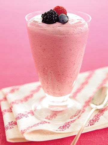 Dive into a frosty layered dessert with fudgy cookies, whipped fluffy yogurt, hot fudge sauce and fresh berries. mixed berry fools | Frothed milk recipes, Mixed berries