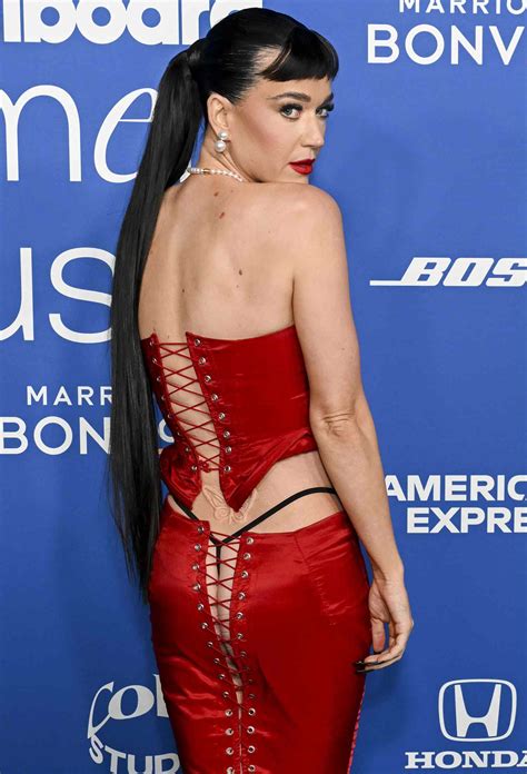 Katy Perry Flashes Her Thong And Backside In Red Lace Up Skirt