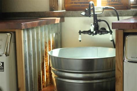 Check that the sink is level from side to side and front to back. DIY Galvanized Tub Sink • The Prairie Homestead