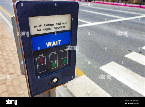 Pedestrian Crossing Push Button On A Post In A Street Stock Photo Alamy