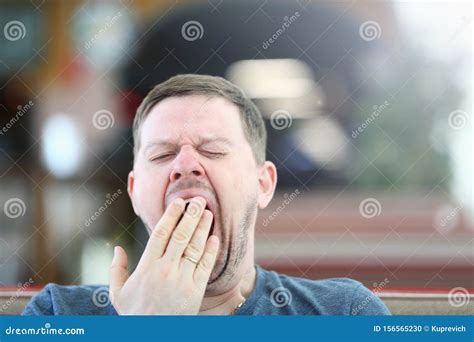Closeup Portrait Of A Tired Yawning Man Of European Appearance Stock 9e6