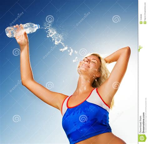 Woman Drinking Water After Fitness Exercise Royalty Free Stock Image