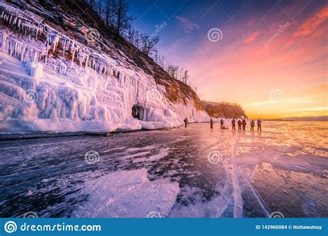 Sunset Sky With Natural Breaking Ice Over Frozen Water On