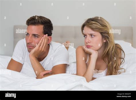 Couple Not Talking After An Argument In Bed Stock Photo Alamy