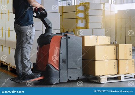 Cargo Boxes Shipment Worker Working With Electric Forklift Pallet Jack Unloading Cardboard
