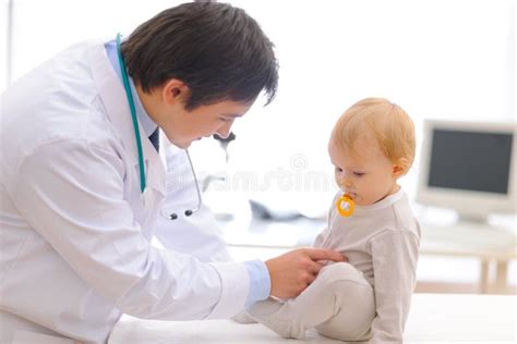 Pediatric Doctor Checking Baby Using Stethoscope Royalty Free Stock