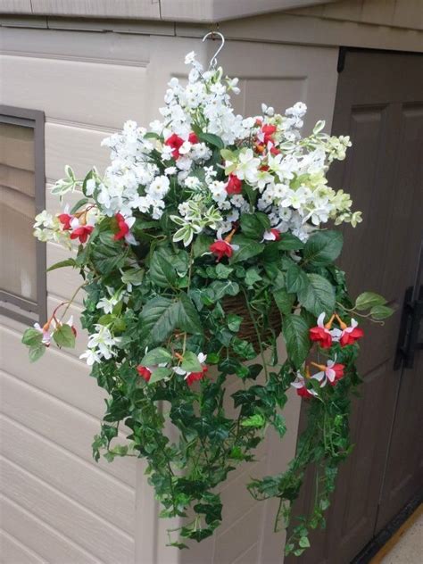 Artificial flowers are just as diverse as regular flowers and are nearly identical in appearance. Hanging basket large with artificial white seven heaven ...
