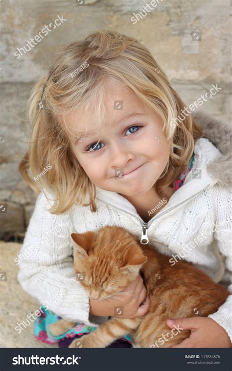 Cute Little Girl Holding Cat Positive Stock Photo 117634876 Shutterstock