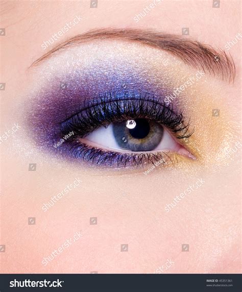 Modern Multicolored Fashion Makeup Of A Female Eye Macro Shot Stock