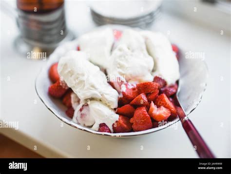 Delicious Bowl Of Strawberry With Ice Cream Stock Photo Alamy