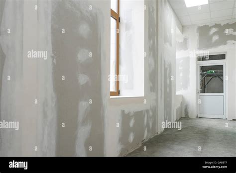 Unfinished Apartment Interior With White Door Stock Photo Alamy