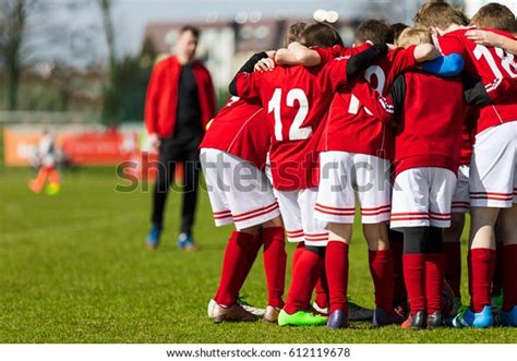 Coach Giving Childrens Soccer Team Instructions Stock Photo 612119678