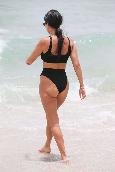 Kourtney Kardashian Bares Curves In Risque Bikini In Miami