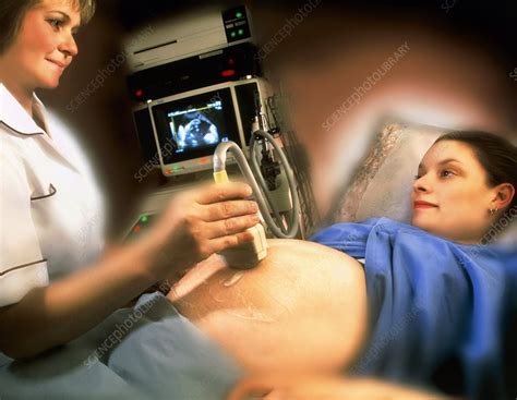 ultrasound scanning of a pregnant woman s abdomen stock image m406 0184 science photo library