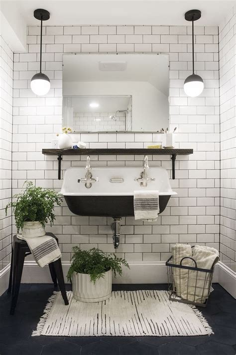 Updating a bathroom in your home is an easy way to boost its appeal if you're looking to sell. Make a mental note for myself: dark grout really showcases the tile work (IF it's quality work ...