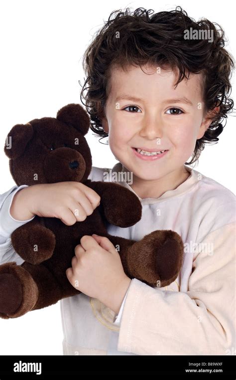 Beautiful And Smiling Child With Brown Teddy Bear Stock Photo Alamy
