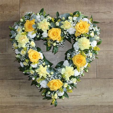open heart in 2021 | Yellow flower arrangements, Funeral flowers
