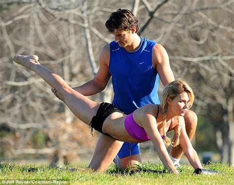 Mother didn't know about a hidden camera under the desk. Brandi Glanville beams with delight as she works out her ...