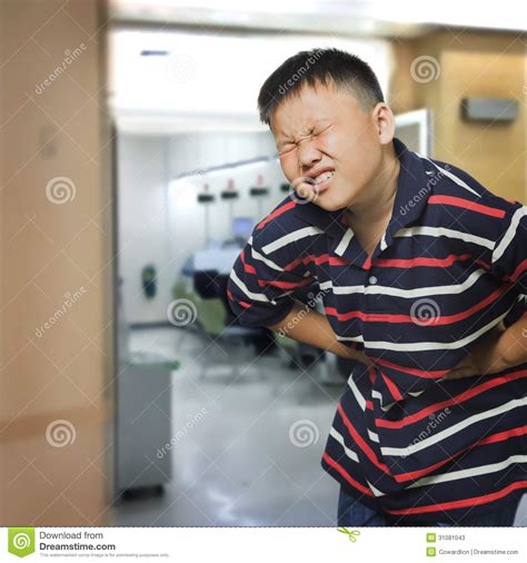 Asian Boy With An Abdominal Pain Stock Image - Image of ...