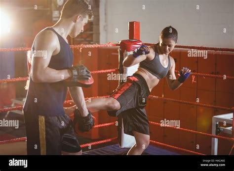 Female Boxer Practicing Kickboxing With Trainer Her Trainer Stock Photo