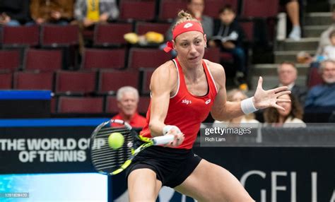 Yanina Wickmayer Of Belgium Hits The Ball Back During The First Match