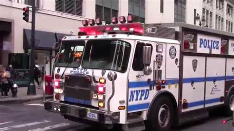 Nypd And Fdny Responding Police Cars And Firetrucks On New York Streets