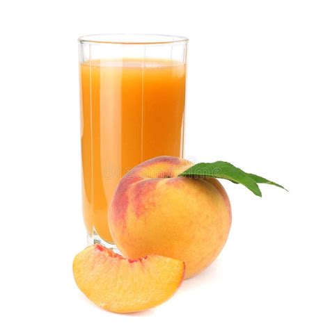 Glass Of Peach Juice With Peach Fruit And Slices Isolated On White