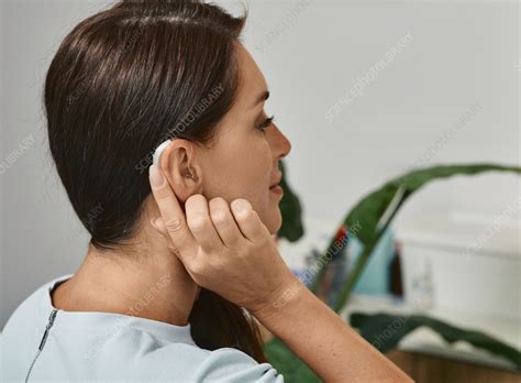 Woman With Hearing Aid Stock Image F0362686 Science Photo Library