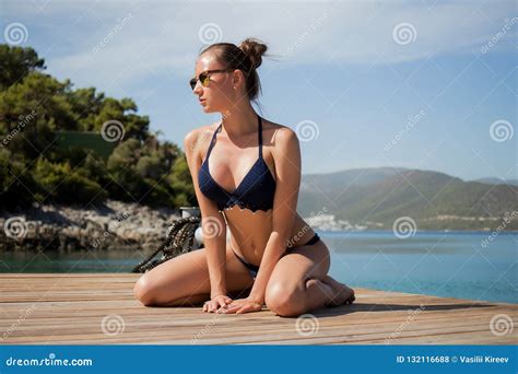 Sensual Woman Sitting On Pier Stock Photo Image Of Resort Summer