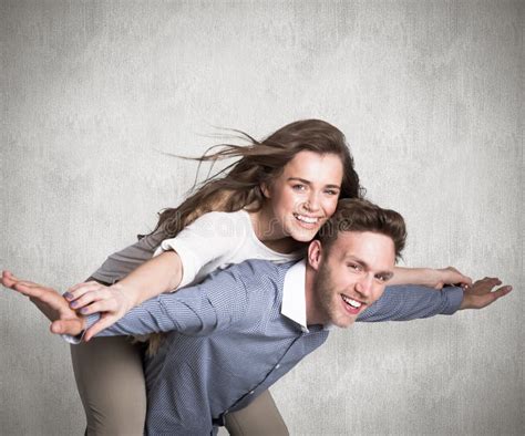 Composite Image Of Smiling Young Man Carrying Woman Stock Image Image