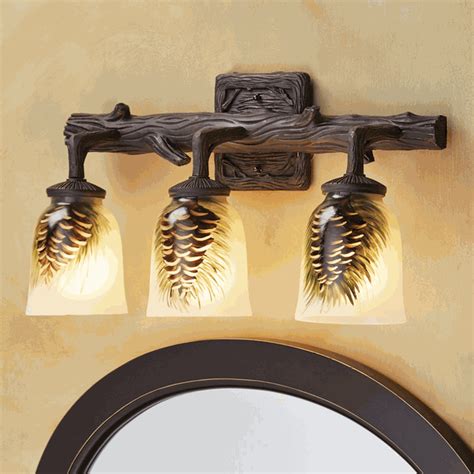 Vanity lighting are a designer's best friend as they provide absolute control over setting the mood of the bathroom. Pinecone Branch Vanity Light - 3 Light | Rustic bathroom ...