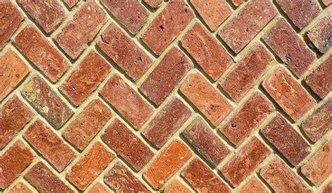 Premium Photo Brick Wall With Orange Bricks Old Cracked Bricks