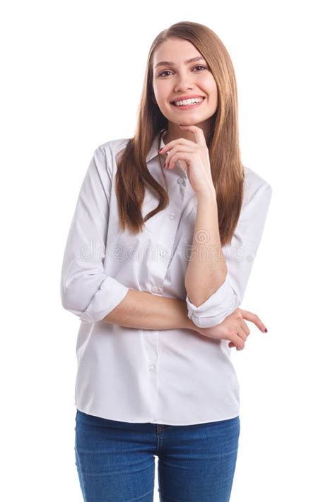 A Girl With A Smile Holds Her Hand Under Her Chin Against A White Isolated Background Stock