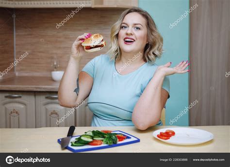 Fat Woman Eating Junk Food Stock Photo Vorobevaola