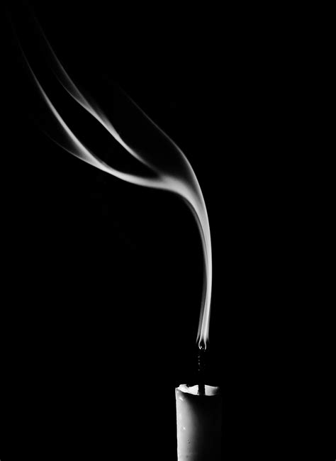 Grayscale Photo Of A Blown Out Candle On Plain Black Background · Free