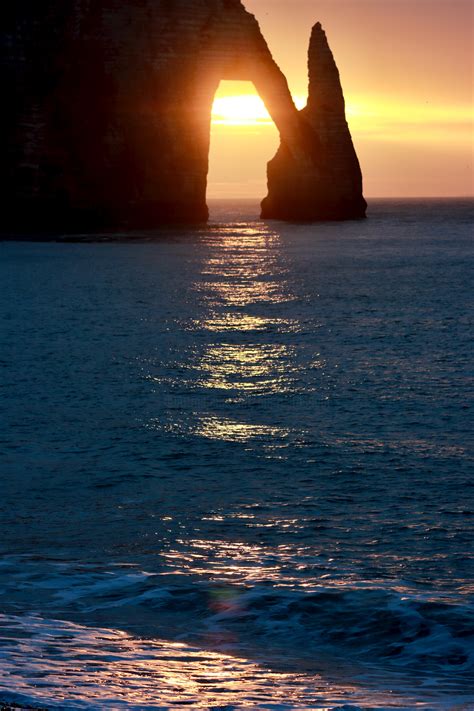 Etretat Soleil Et Arche Photographie Par Pierre Yves Rospabé Artmajeur