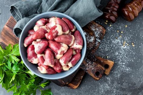Raw dog food is a delicious, nutritious meal to serve your dog. raw dog food diet chicken hearts
