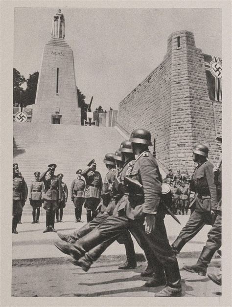 German Soldiers March Triumphantly Past The French Wwi Victory Monument