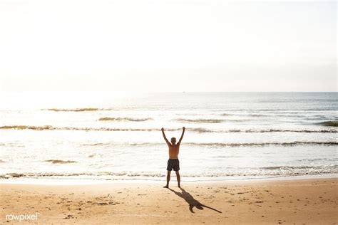 Download Premium Image Of Senior Caucasian Man Standing At The Beach