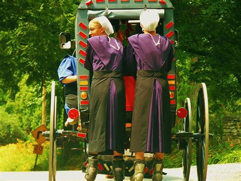 amish girls on roller blades photograph by jeanette oberholtzer pixels