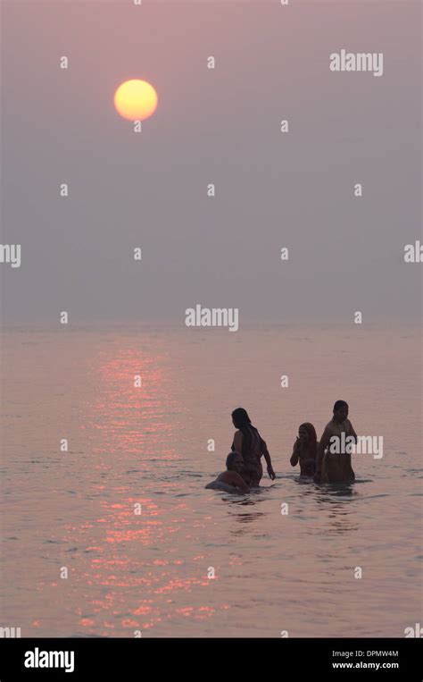 Female Pilgrims Bathing In The Cold Waters Of The Bay Of Bengal At