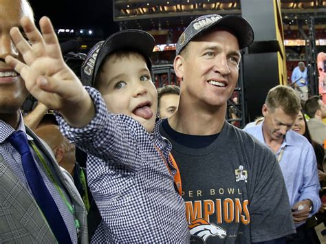 Denver broncos qb peyton manning victorious with his children mosley and marshall on podium after winning game vs carolina panthers at. Broncos players share spotlight with their children after ...