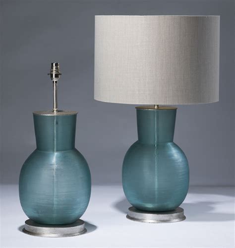 Pair Of Medium Sky Blue Cut Glass Lamps On Distressed Silver Leaf Bases T3000 Tyson