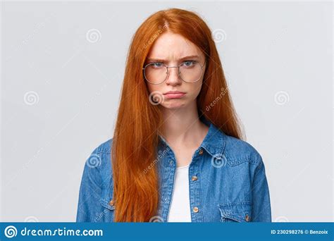 Close Up Portrait Strict And Angry Mad Gloomy Redhead Girl Staring