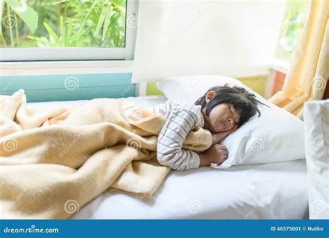 asian girl sleeping on bed covered with blanket stock image image of calm girl 46375001
